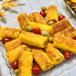 رول سوخاری ژامبون و پنیر پیتزا دونه ای 